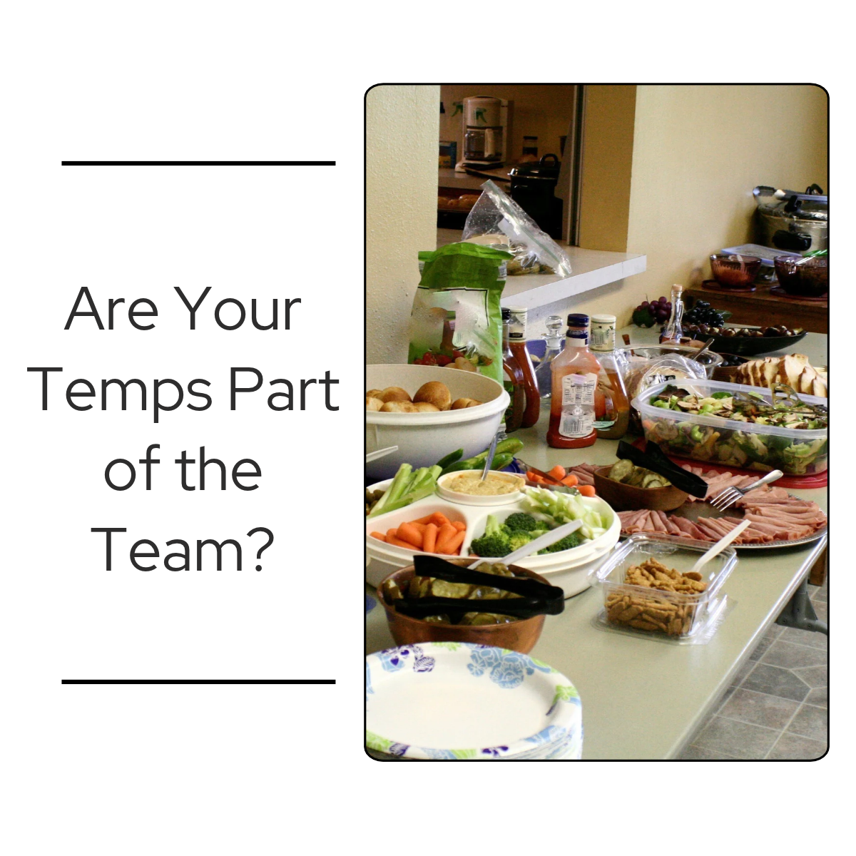 Break room table set with a buffet lunch of rolls, a vegetable tray, deli meats, salad, and paper plates.